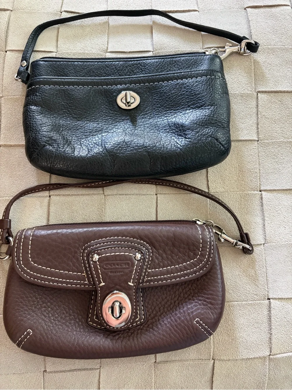 Two Leather Cluthes (Brown is Coach)